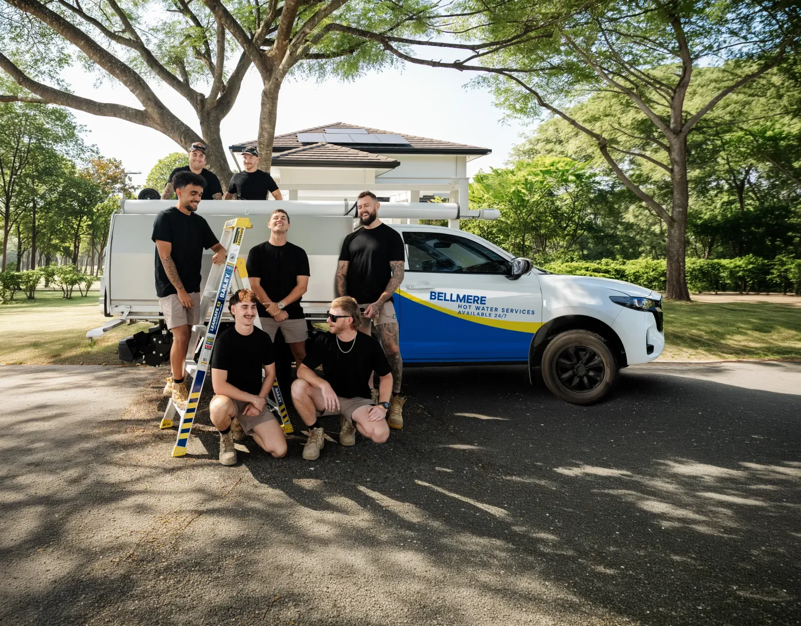Bellmere Hot Water Services team and ute